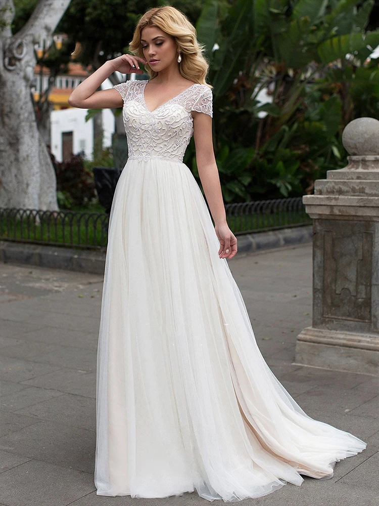 

Роскошные свадебные платья-трапеции с V-образным вырезом, украшенные бисером, роскошные тюлевые платья без рукавов, сексуальное платье с вы...