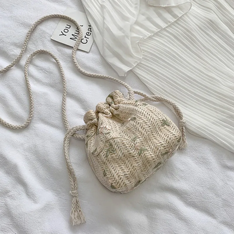 

Летняя сумочка из соломы женский 2021New корейской версии и надписью «Wild One»-сумка на плечо модная плетеным кружевом сумка-мешок Bolsos Mujer