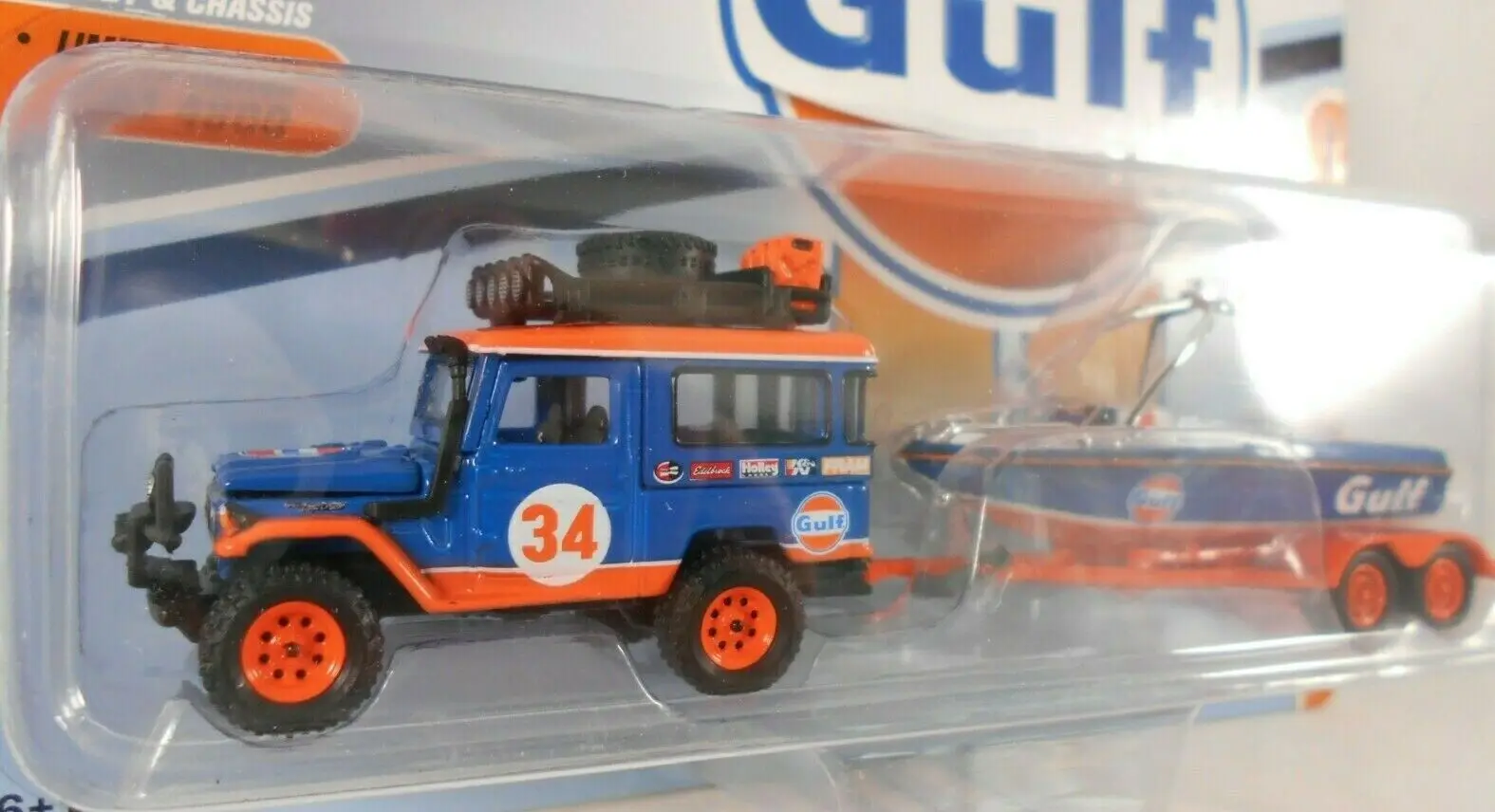 Автомобиль Johnny Lightning масштаба 1/64 Toyota Land Cruiser FJ40 Gulf Oil GULF2019 коллекционная металлическая машинка подарок для мальчиков.