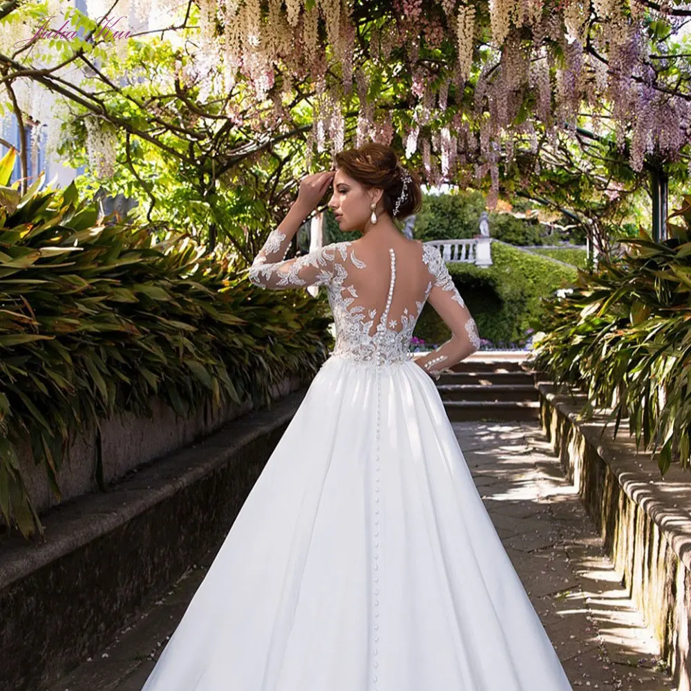 

Julia Kui Skin Nude Of Long Sleeve A Line Wedding Dresses With Gorgeous Satin Skirt Of Sweep Train Wedding Gown