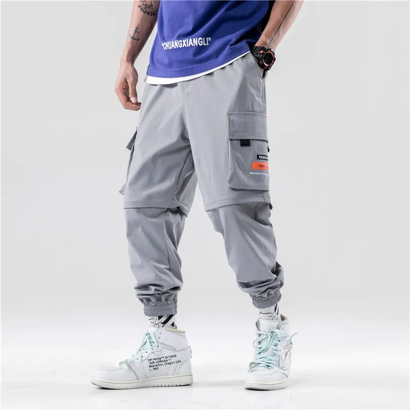 

Мужские весенние повседневные короткие брюки со съемной молнией, Корейская уличная одежда, новинка, мужские брюки-карго в стиле хип-хоп, повседневные брюки-султанки 3XL