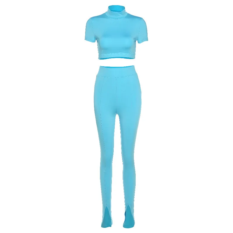 Женский спортивный костюм синий комплект из двух предметов укороченный топ с