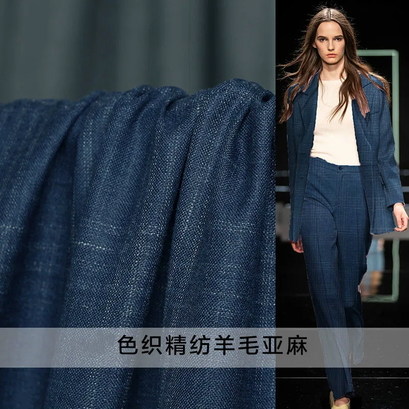 Костюм шерсть ткань из окрашенной пряжи гребенной шерсти темно синего цвета в