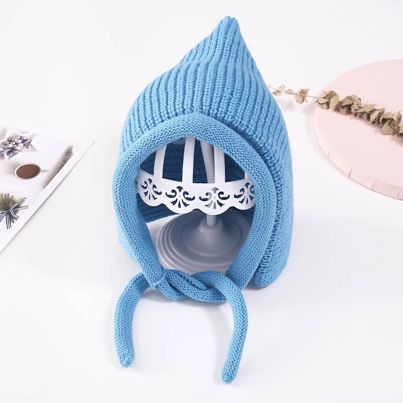 

Children's hats for autumn and winter new baby pure color curled rim rope knitted hat, warm ear protection, windproof woolen hat