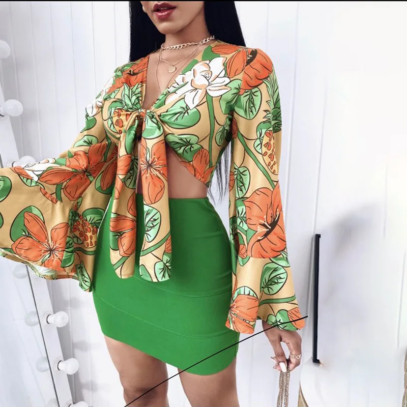

New two piece print top with open navel and short skirt with buttocks