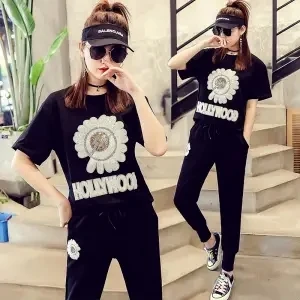 

2021 new short sleeve spring and summer sports two-piece suit female foreign style Korean version of loose leisure fashion suit