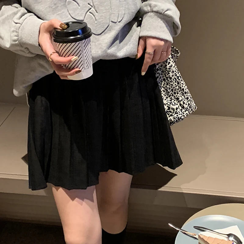 

Solid High Waist Loose Pleated Skirt Woman's Korean Style Cute Black Mini Skirts Women Simple Elastic Waist Tennis Skirt Woman