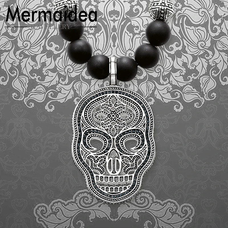 Длинное ожерелье с большим кулоном в виде черепа бусины кресты модное