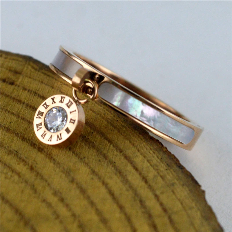 

Hip Hop Jewelry Luxury Designs White Color Shell Roman Number Finger Ring for Women Gothic Stainless Steel Wedding Band Anillos