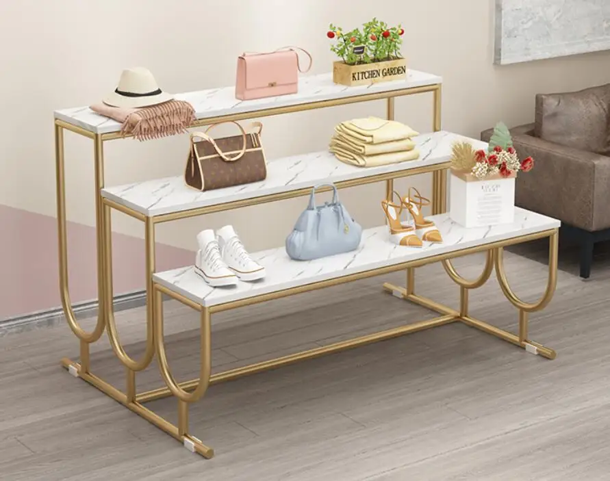 

Shopping mall high, middle and low three shelves shoes shop bag marble running water clothing shop light luxury iron display