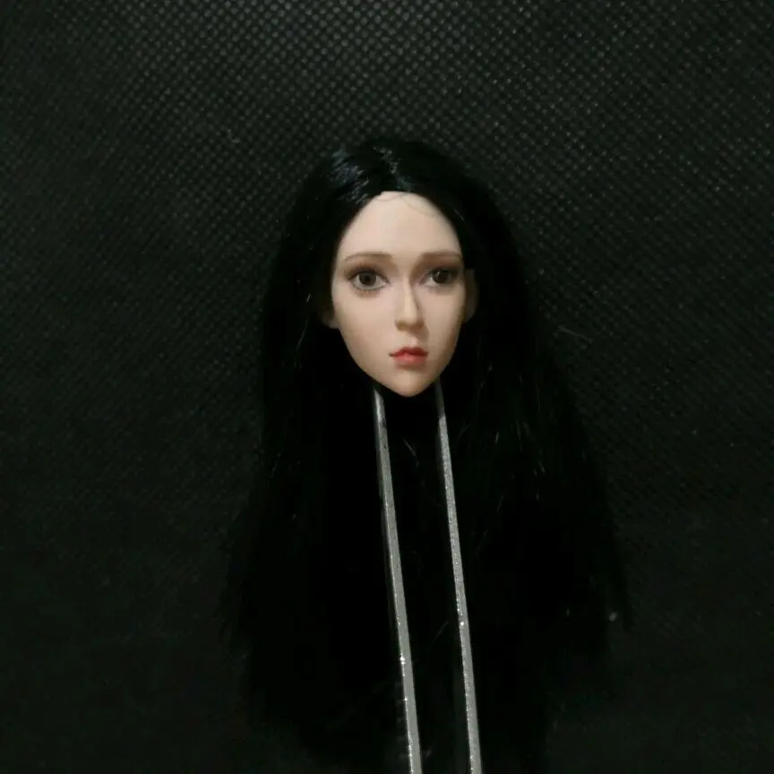 

This is bubble help Custom 1:6 Female Head Carton Girl PVC Plastic Model Toy Black Hair For Doll in stock
