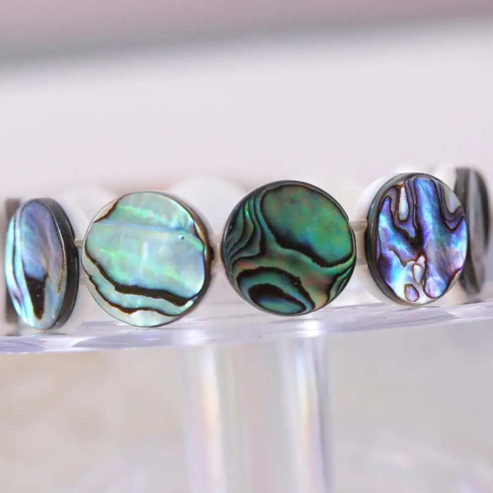 Браслет натуральный 16 мм круглые бусины синий Новая Зеландия ушка оболочки