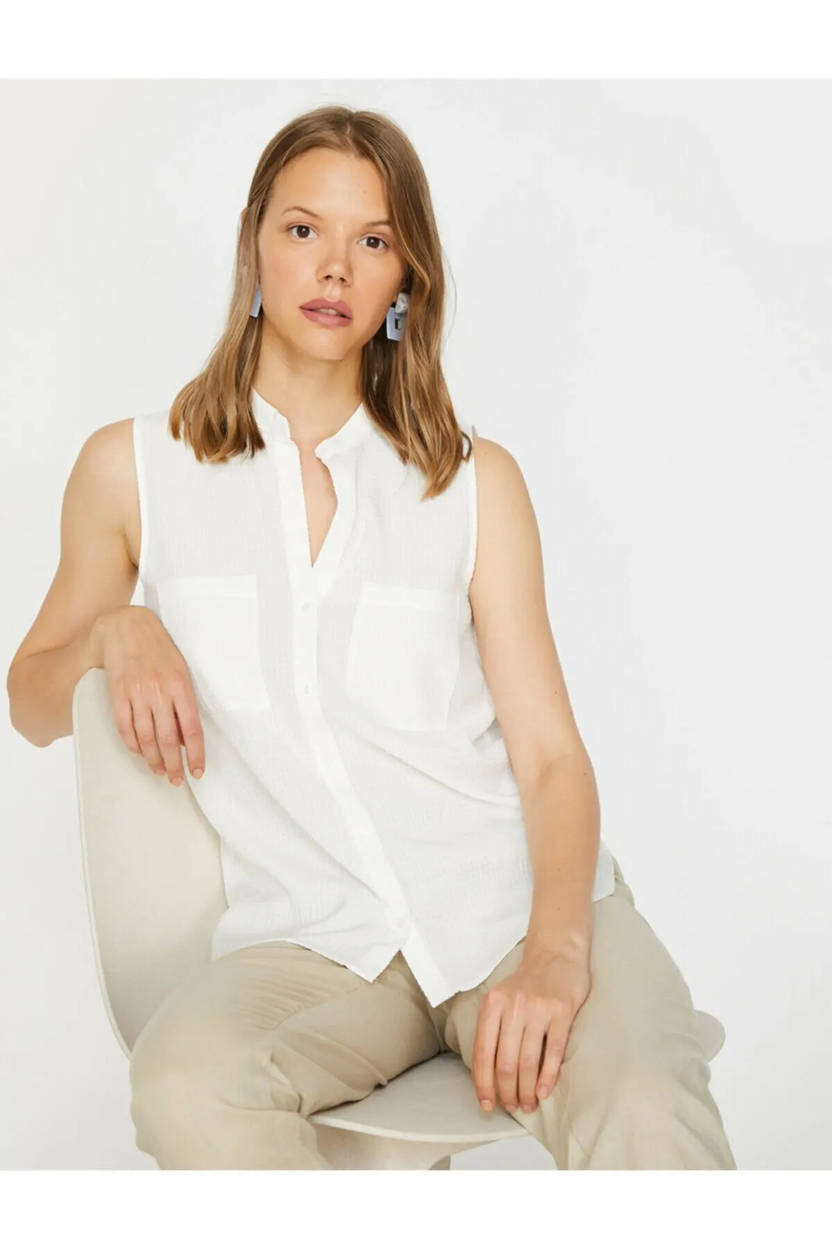 

Женская рубашка с карманами