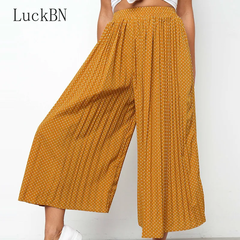 Женские свободные широкие брюки LuckBN черные желтые укороченные в горошек с