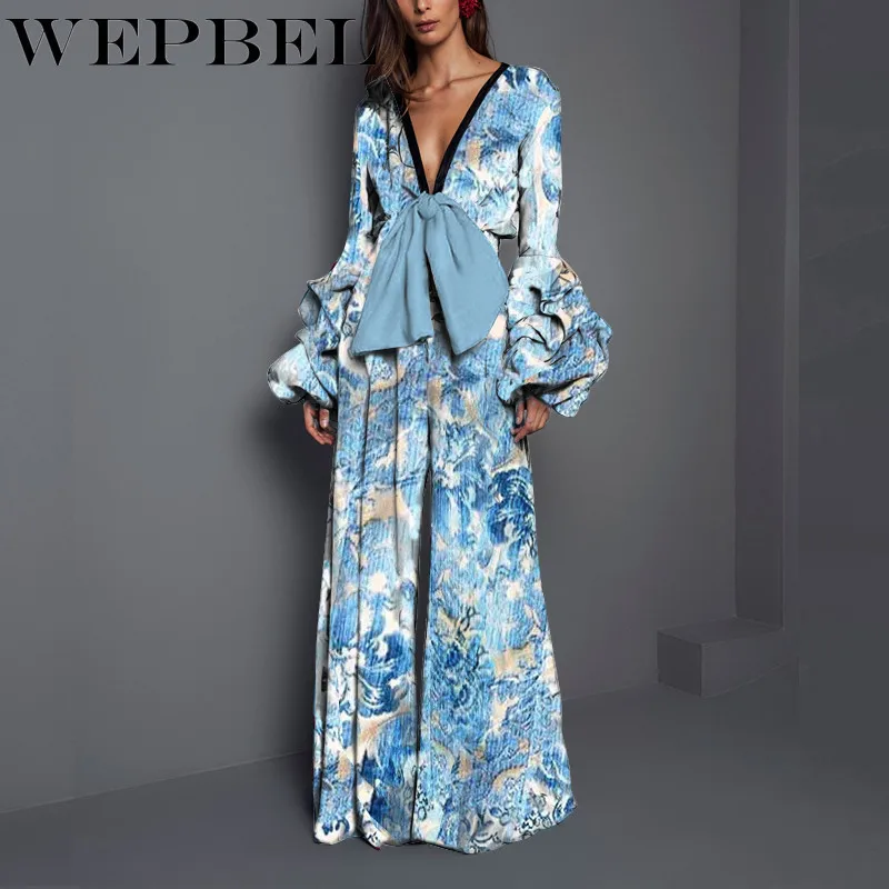 

Mandylandy Women Sexy Summer Print Jumpsuit Lady Elegant Loose Deep V Neck Bow Tie Romper Overalls Female Wide Leg Onesies