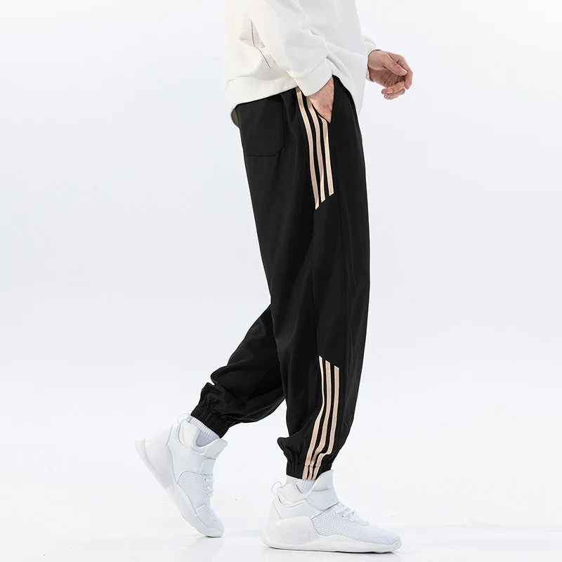 

2021 plus size men's sports casual pants increase fat elasticity and slimmer trendy fashion casual trousers