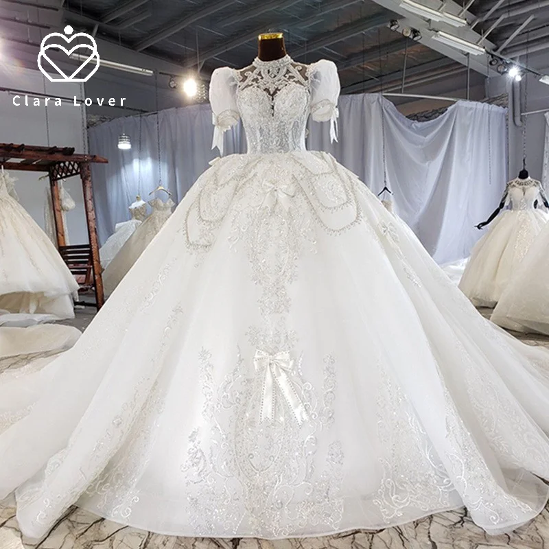 

New 2021 summer princess style lace hollowed out aesthetic bubble sleeve slim tailed light luxury wedding dress