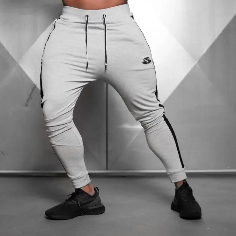 Бодибилдинг бренд тренажерные залы Мужские Брюки Компрессионные Gymming леггинсы для мужчин фитнес тренировки летняя спортивная форма Мужские дышащие брюки