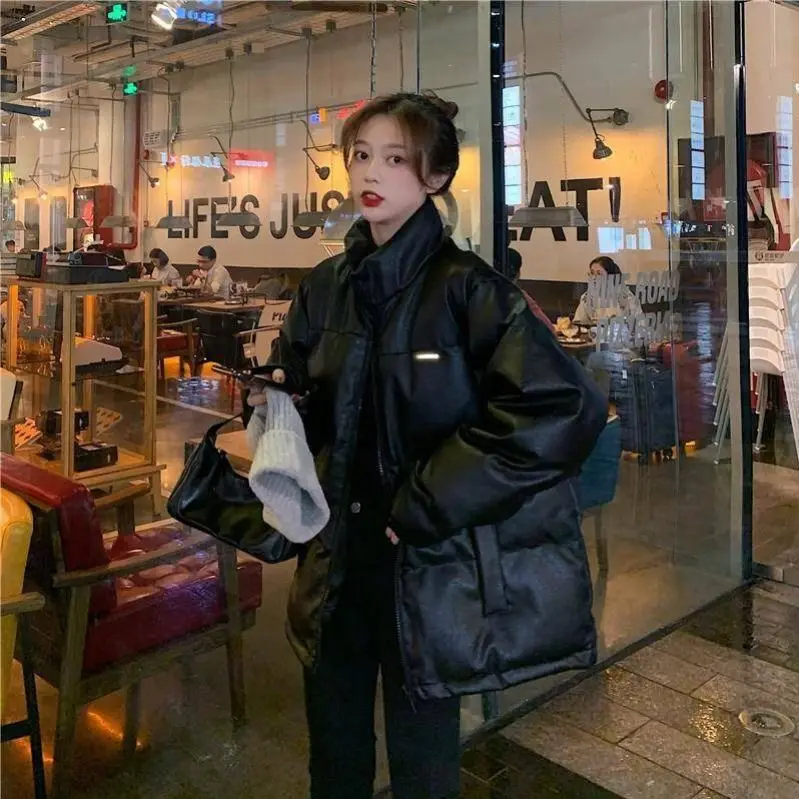 

In winter 2021, the new Korean PU leather jacket for students with bright face, loose and thickened cotton padded clothes and