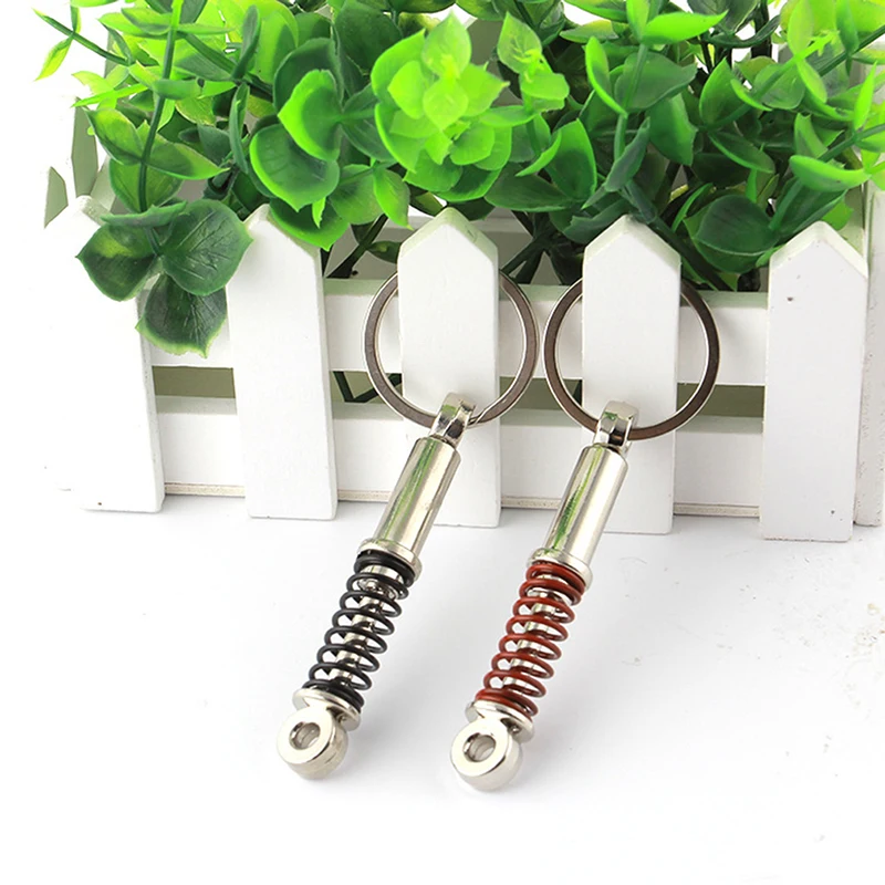 Творческий модификация автомобиля брелки для ключей амортизаторы автомобильный