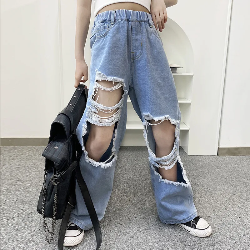 Рваные джинсы для девочек новинка весны 2021 стильные свободные подходящие ко