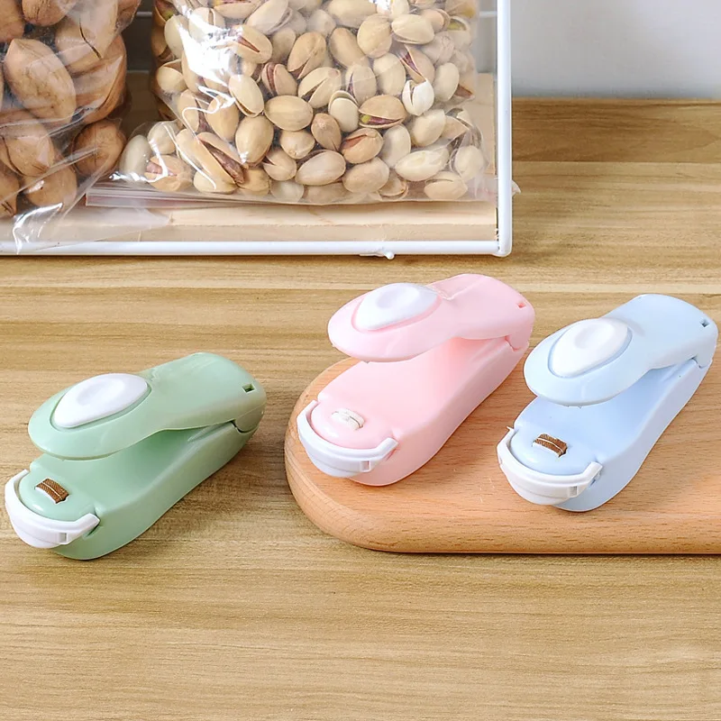 

New Style Portable Mini Sealing Machine Snack Plastic Bag Sealing Machine Hand Pressure Heat Sealing Small Machine