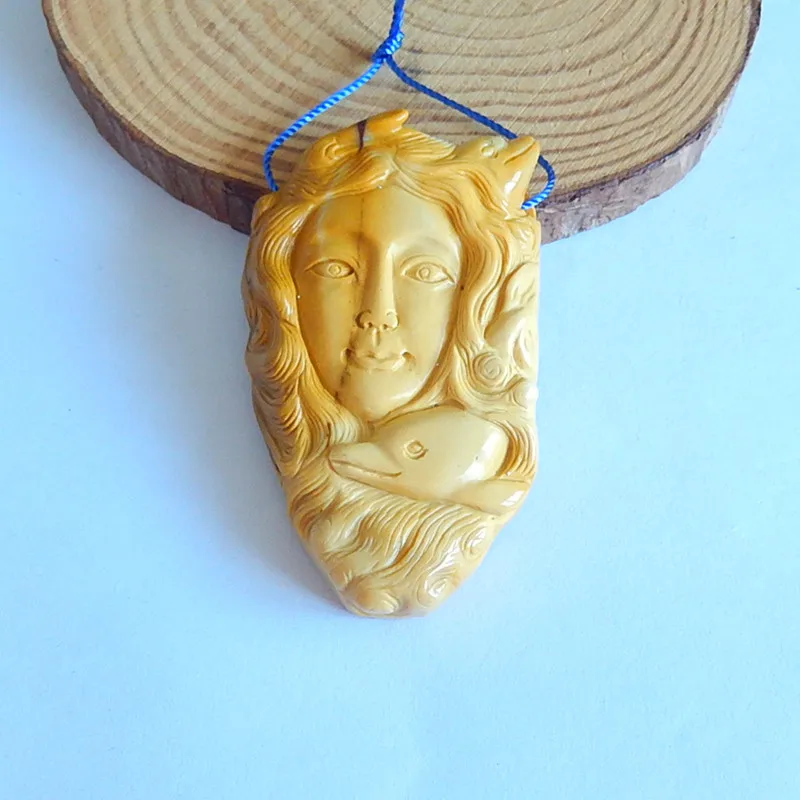 

Natural Fashion Carved Mookite Jasper angel with fish Pendant,63x36x10mm,37g