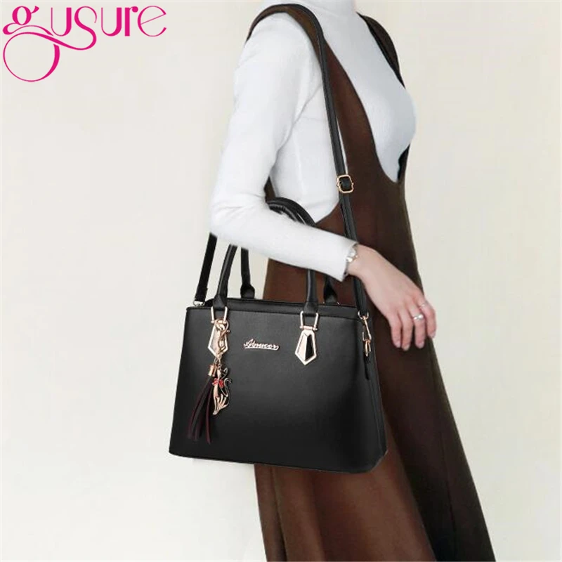 Женская сумка с кисточками Gusure из искусственной кожи однотонная маленькая на