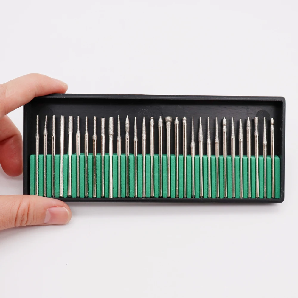 

Набор сверл, комплект из 30 насадок с алмазным наконечником и хвостовиком 2,35 мм, для шлифовки и полировки