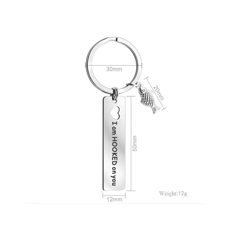 Нержавеющая сталь брелок 每当变幻时 выгравированы очарование рыбы в форме сердца