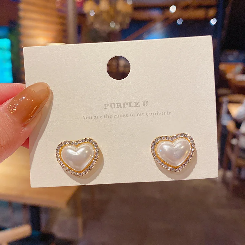 

S925 silver needle advanced pearl Love Earrings Korean personality simple heart earrings