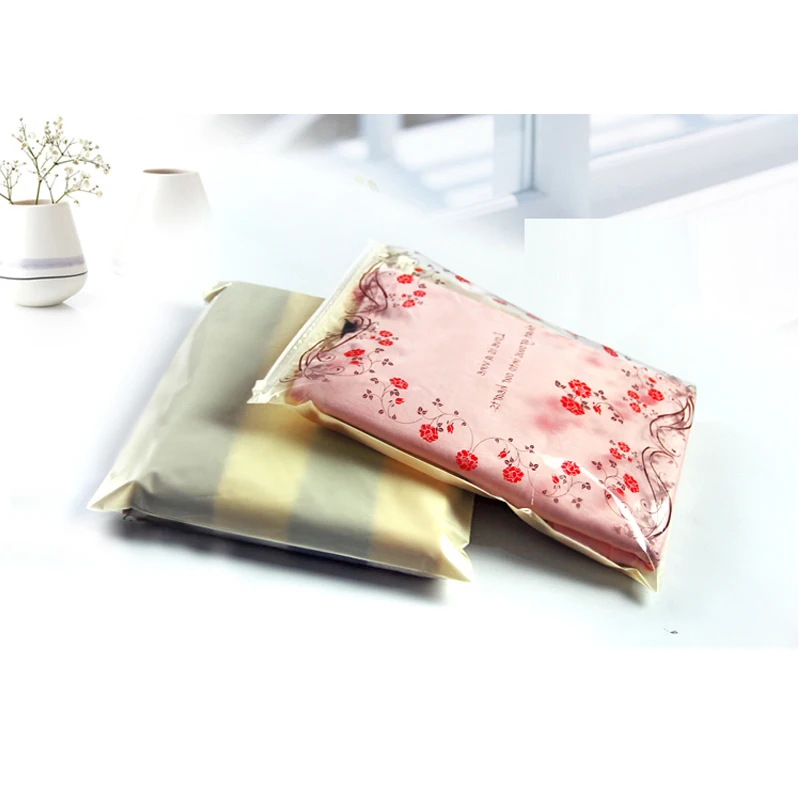 Прозрачная сумка с принтом розы на молнии застежкой желтая задняя одежда