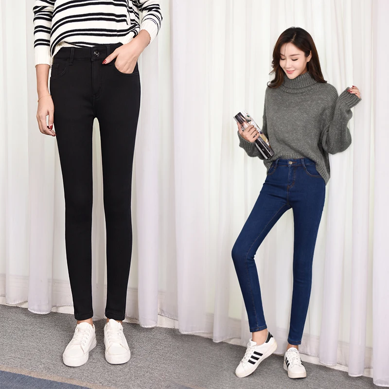 Джинсы женские зимние большого размера 40 теплые бархатные плотные облегающие