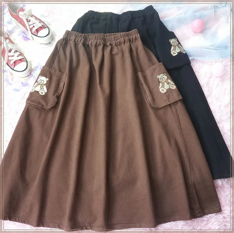 Фото Осенне-зимняя женская утепленная мягкая трапециевидная юбка средней длины с