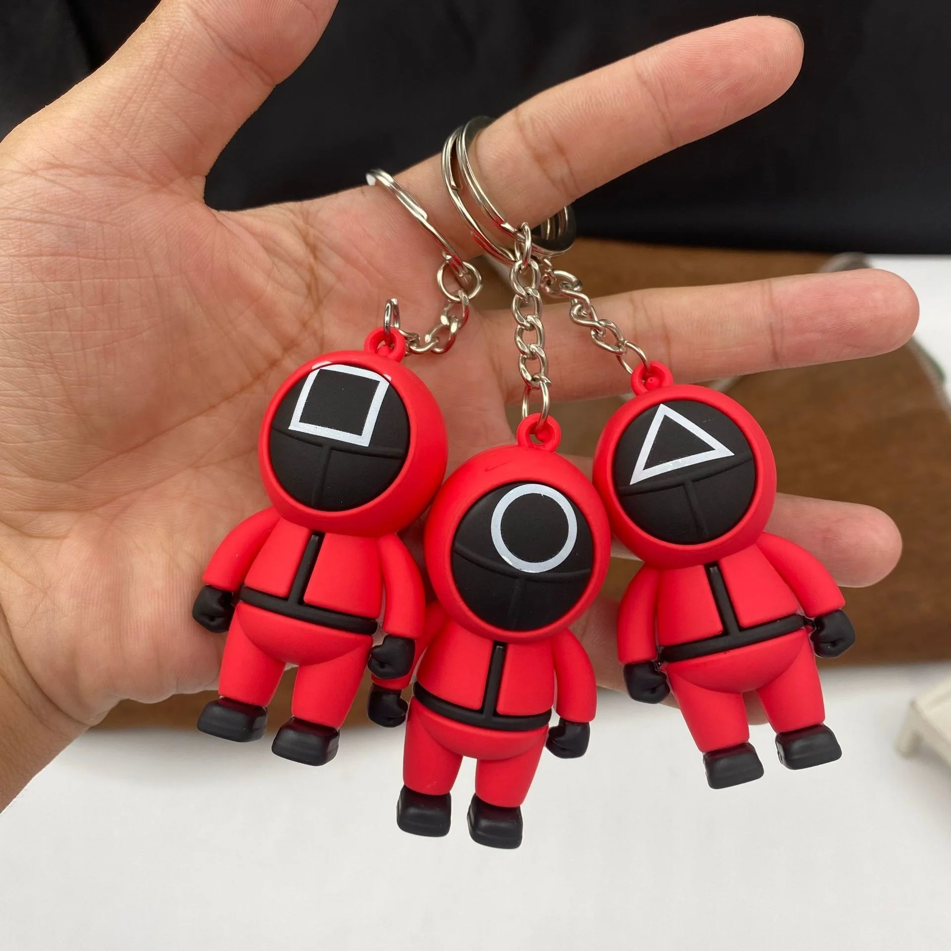 

Брелок для ключей с 3d-рисунком из игры «кальмар»