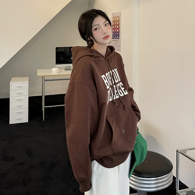

Американский свитер с капюшоном женский весенний и осенний 2021 Новый Свободный корейский топ с ленивым дизайном ощущение свободы