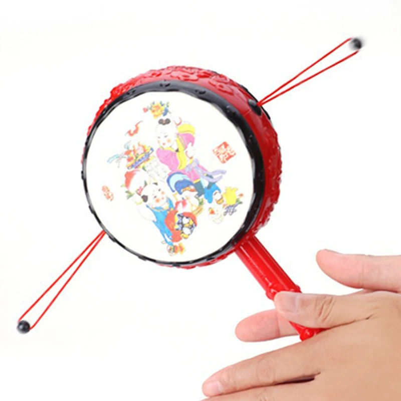 

Красный китайский традиционный вращающийся игрушечный барабан, детский мультяшный ручной Колокольчик из пластика для малышей