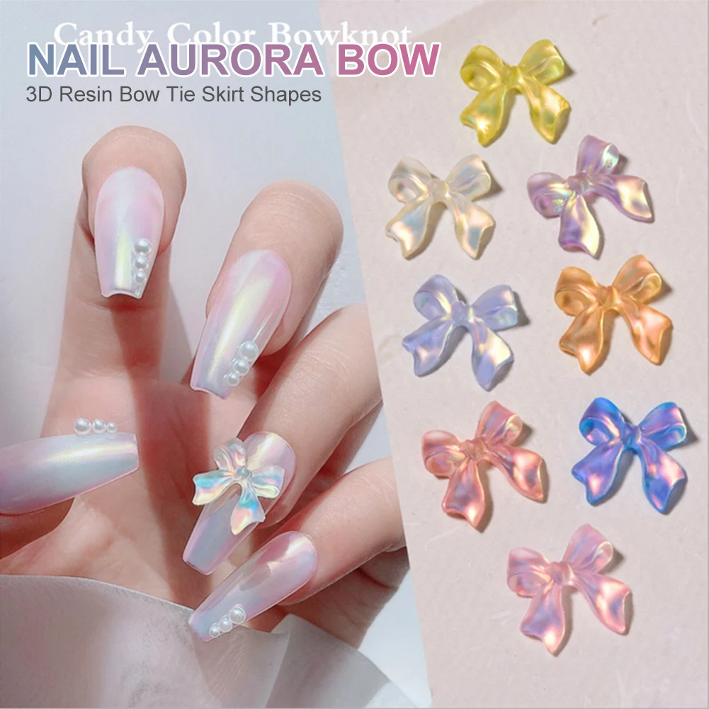 

50/100pcs Aurora Bow Knots Nail Art Rhinestones 3D Resin Bow Tie Skirt Shapes Nail Glitter Decoration Manicure Decals Accessorie