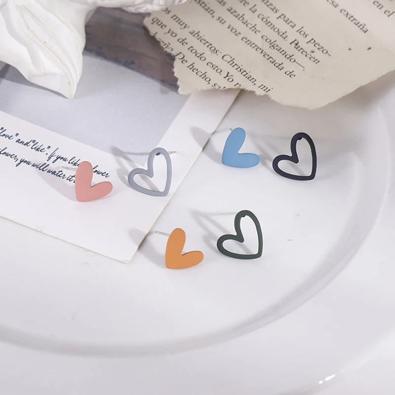 

Trend Asymmetric Hollow Heart Earrings for Women 2021 Beautiful Girl Cute Party Jewelry Korean Yellow Blue Stud Earrings