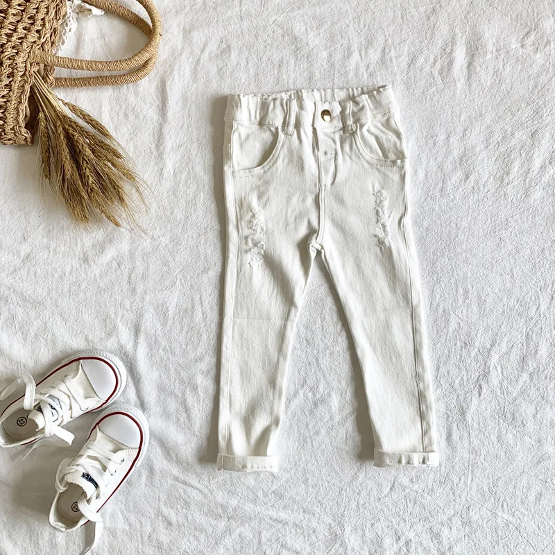 Демисезонные рваные джинсы для маленьких девочек детские брюки с дырками белые