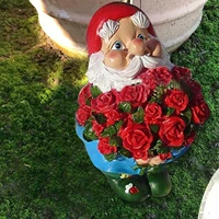 a dwarf holding a rose garden statue outdoor decorations santa claus with roses sculpturessnail funny resin christmas ornaments