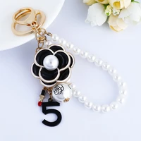 fashion alloy flower keychain cartoon cute oil camellia pearl key ring jewelry for women girl car bag pendant keyring gift