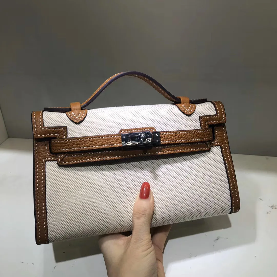 

free shipping 2020 the new style fashion simple canvans women handbag one shoulder bag crossbody bag 3 color 22cm