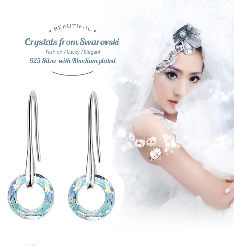 Серьги-подвески женские серебристого цвета круглые с кристаллами ручной работы |