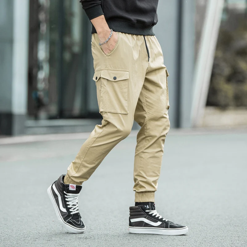 

Streetwear Fashion Designer Men Jeans Multi Pockets Khaki Casual Cargo Pants Men Hip Hop Joggers Wide Leg Ankle Banded Trousers