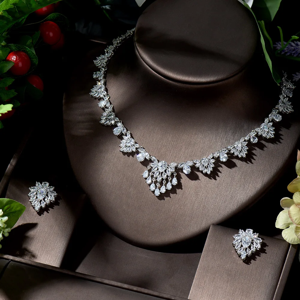 

Роскошное ожерелье и серьги HIBRIDE из Дубая с кубическим цирконием, свадебные комплекты для женщин, блестящее платье с кристаллами и листьями ...