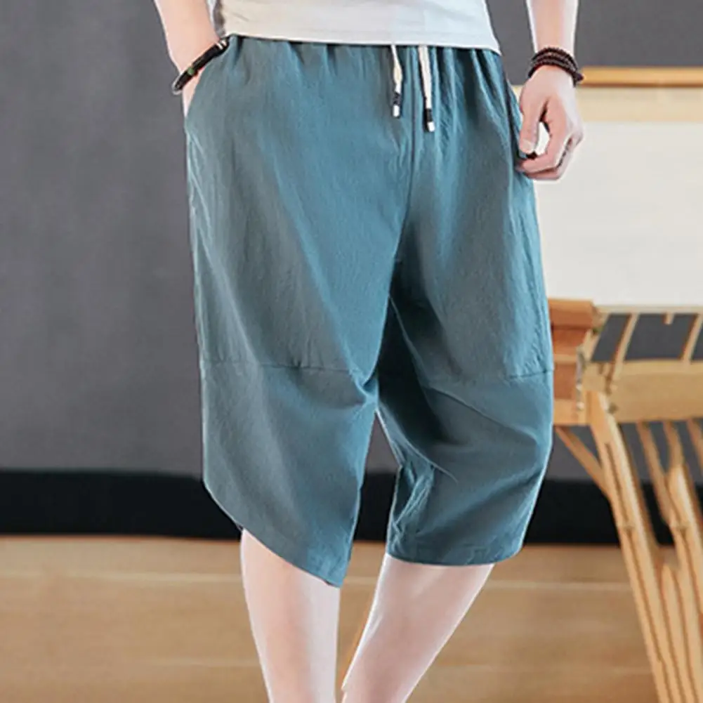 

Solid Color Capri Pants Elastic Waist Men Wide Leg Irregular Hem Thin Men Pants Sweatpants