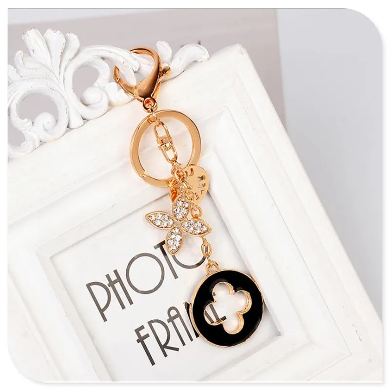 Цепочка для ключей в виде клевера изящная металлическая подвеска автомобиля