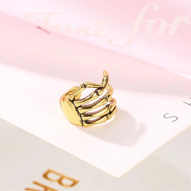

Personality PUNK style skull hand men and women ear bone clip earrings no pierced ear clip fashion jewelry gift spot wholesale