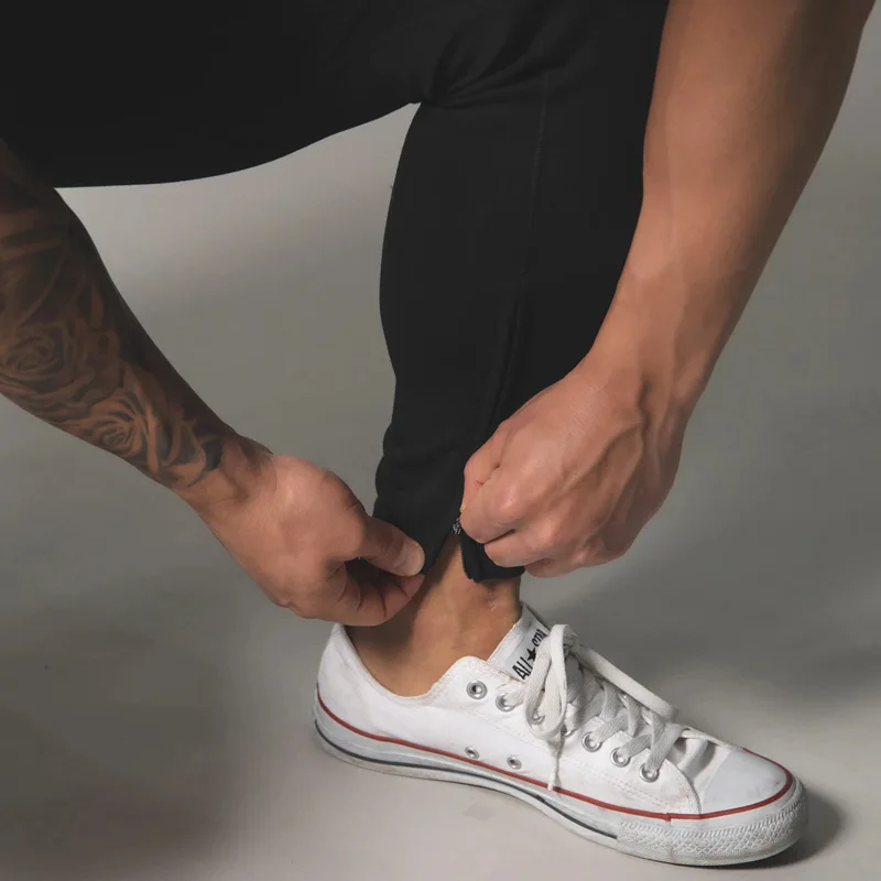 

2020 New Fitnesswear Mens Pants Zipper Pocket Gym Sweatpants Cotton Men Fitness Joggers Running Pants Casual Training Trousers